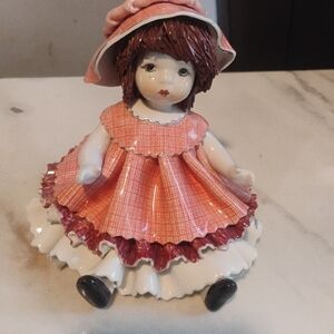 Charming Porcelain Doll Sculpture in Pink and White